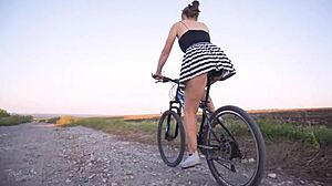 Hidden camera captures girl in short skirt riding a bicycle