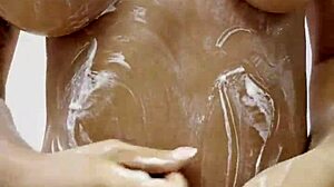monika fox poses naked and smears cream on her body at home