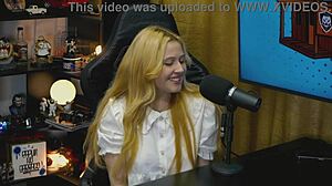 A branquinha from viamms poses on podcast table for show.