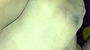 Beautiful girlfriend gives a sensual footjob in sheer nylons