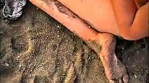 Stranger gives blowjob on public beach