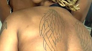 Ebony babe licks phat pussy while bound in bondage