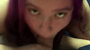 A blonde with purple hair gives a blowjob and gets a mouthful of semen