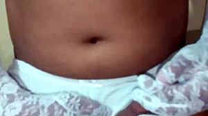 Thai ladyboy shemale seductively poses in erotic white panties and bra