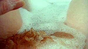 Annie's big tits fingered in monster bath bubbles