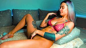 Barbie girl with body art gets naughty on webcam