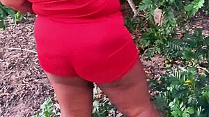 Evangelical neighbor picking fruits outdoors.