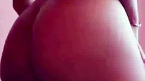 Pretty ebony babe engages in softcore striptease, playing with herself