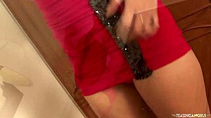 brunette in red dress enjoys a casual encounter with her partner