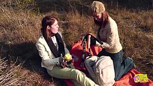 brunette friends turn picnic into strapon sex