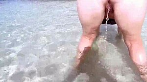Chubby Woman with Sexy Ass Pisses in Outdoor Water