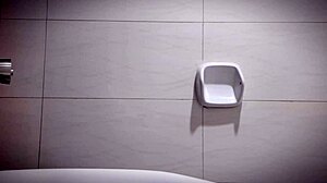 pretty office girl in the bathroom with big natural tits