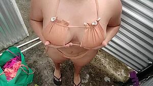 New amateur video with a woman in a dressing room in public