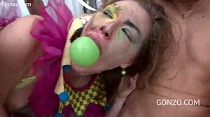 Ella Nova takes 10on1 clown gangbang with rough deepthroat