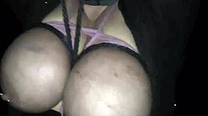 Big tits are slapped and fucked in a garage BDSM scene