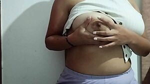 milf massages her huge natural tits with real pleasure at home