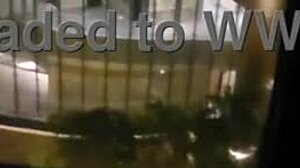 Masturbating in public in front of hotel window