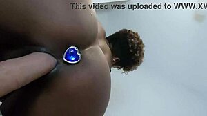 mature latina uses dildo on bed