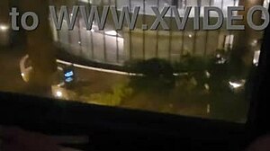 Masturbating in public in front of hotel window