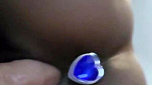 mature latina uses dildo on bed