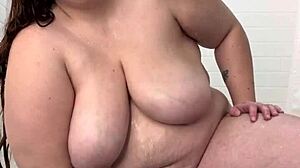 Oiled up chubby hucow masturbating in the shower