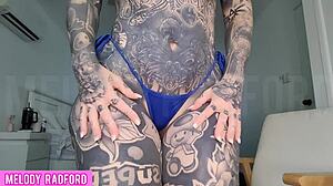 milf tries on micro bikini with vibrating plug