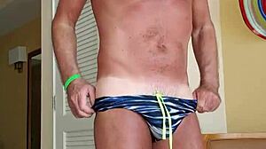 pervy guy strips speedo after beach day in lycra fetish