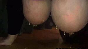 Big tits are slapped and fucked in a garage BDSM scene