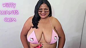 Kitty's craving cum in her bikini.