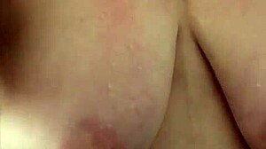 Curvy BBW mama tantalizes in shower, washing hair and shaving her natural big tits