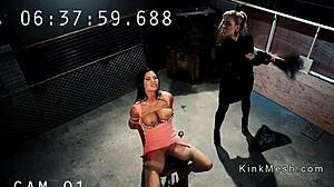 huge tits brunette takes strap-on in her ass with whipping and bondage