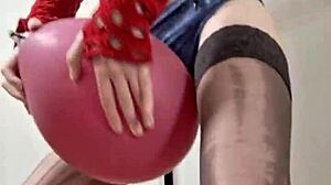 Tall teen mistress Elza Kom dominates with balloons and feet