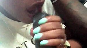 The guy got a blowjob from an ebony slut in his car at the mall
