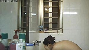 Spying on a curvy Indian woman in the shower