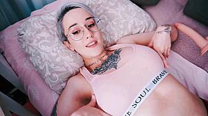 The fuckmachine tittyfucks my tattooed teen tits with dildo