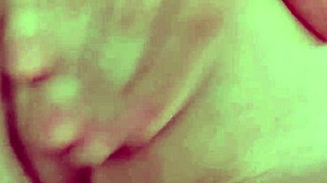 A little girl is playing with her pussy with her fingers