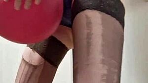 Tall teen mistress Elza Kom dominates with balloons and feet