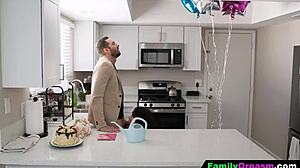 Stepdaughter kneels to blow her stepdad in a sneaky family moment.