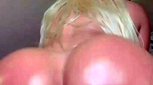 This blonde twerks her huge oiled ass and tits.