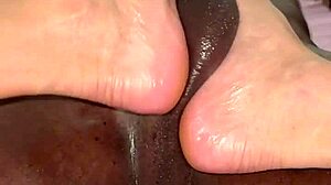 hey, wanna watch me massage his huge cock with my feet?