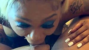 pretty ebony face says 'i love sucking big black cock'