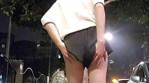 Shemale ting xuan exposes butt outdoors and cums on legs