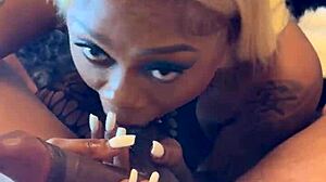 pretty ebony face says 'i love sucking big black cock'