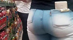 spying on the hot brunette ass in jeans at the shop