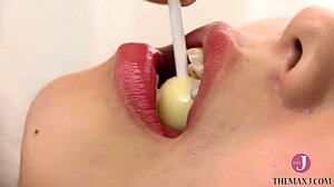 babe licks candy nastily in kitchen 😈