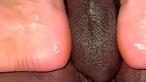 hey, wanna watch me massage his huge cock with my feet?