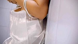 A chubby woman gets excited by playing with her tits