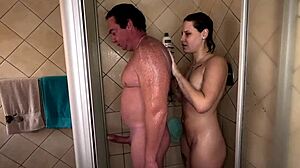 Hot slut gives handjob in steamy shower with big cock