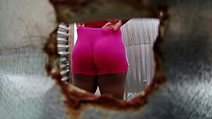 Amateur camera on a sexy Latina in the changing room of the beach