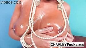 Charley got a special pearl necklace and oiled her tits